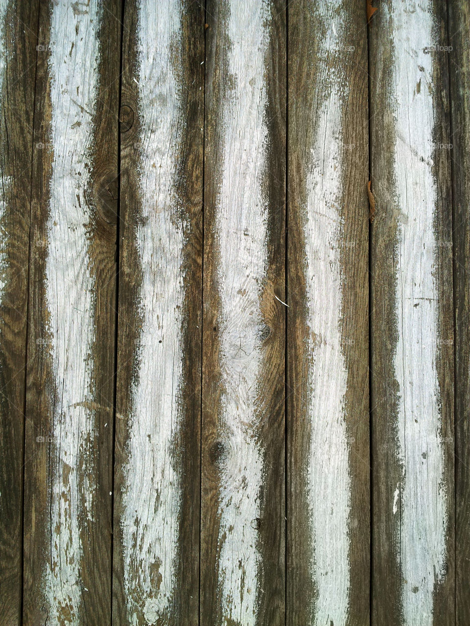 White painted lines faded on wood