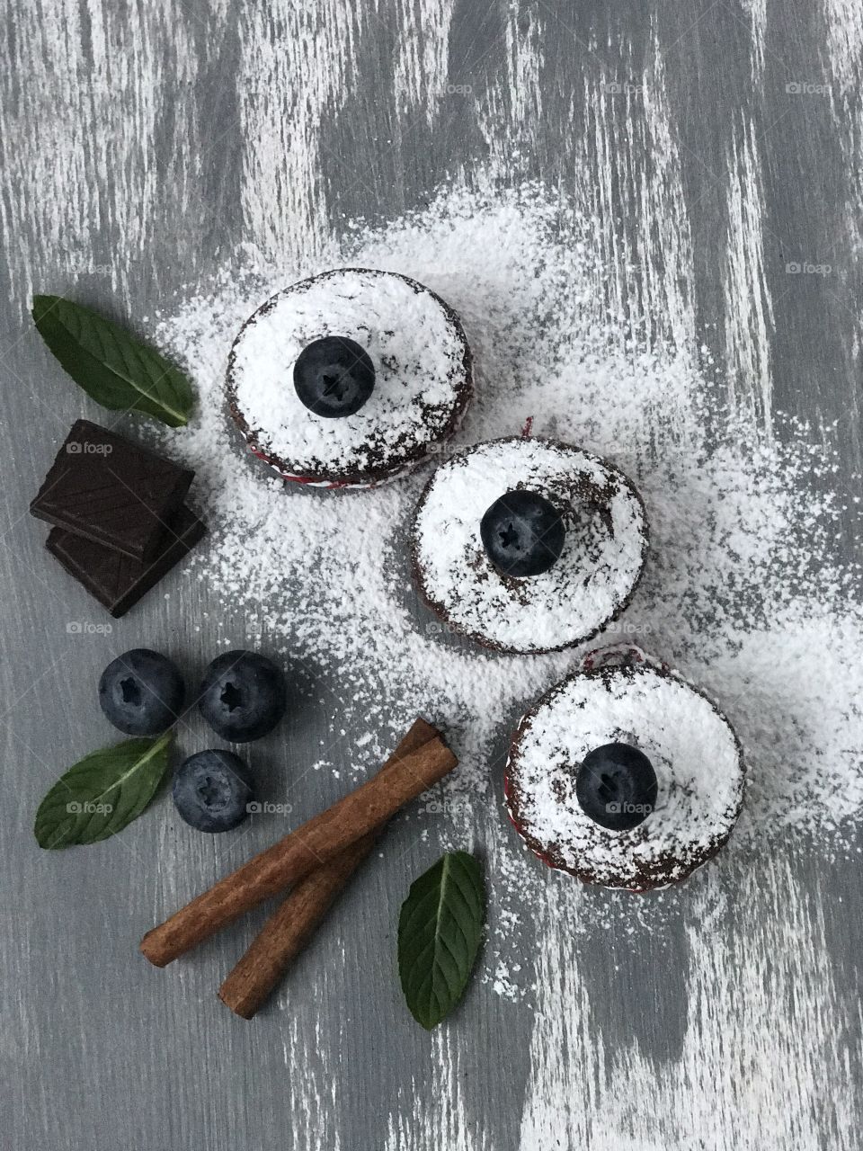 Chocolate muffins and blueberries.