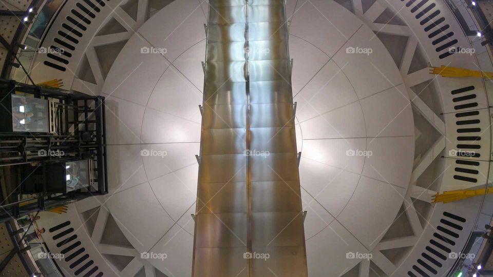 Under the escalators