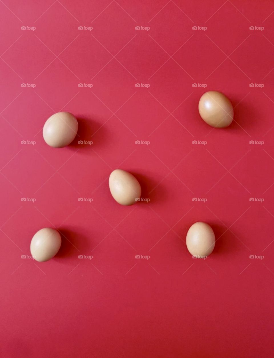 Eggs on a red background.