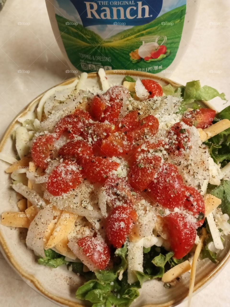Homemade salad with ranch dressing prepared by photographer and cook Mark Sarden