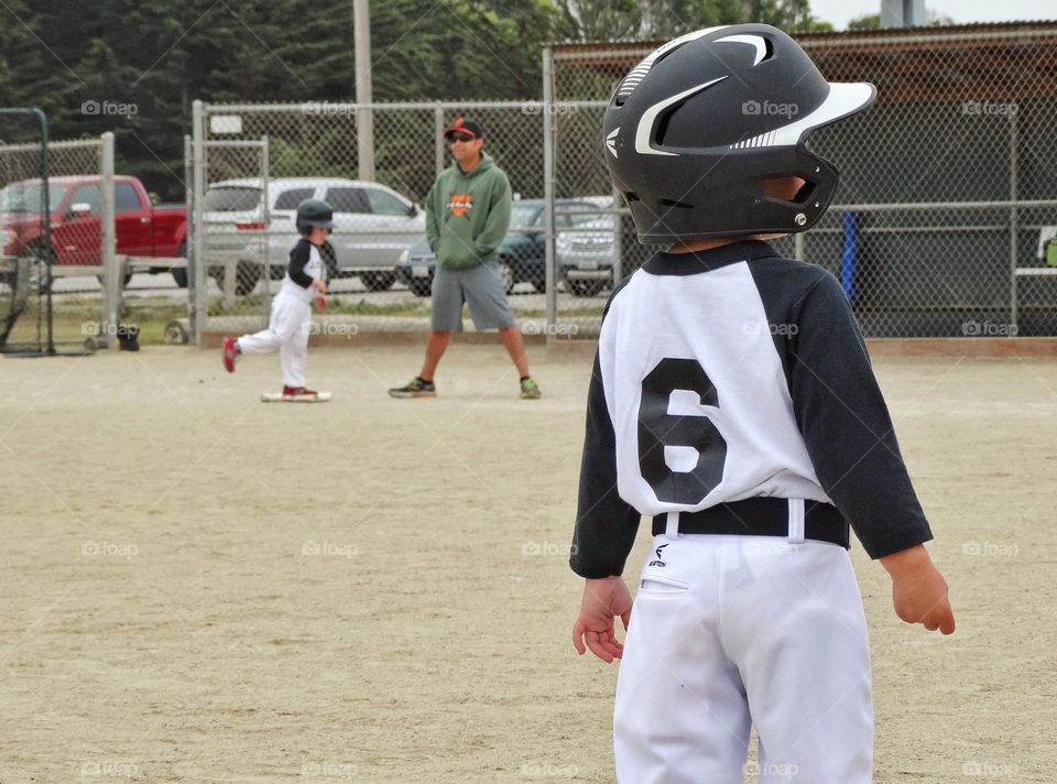 Young Baseball Players. Children Playing American Little League Baseball
