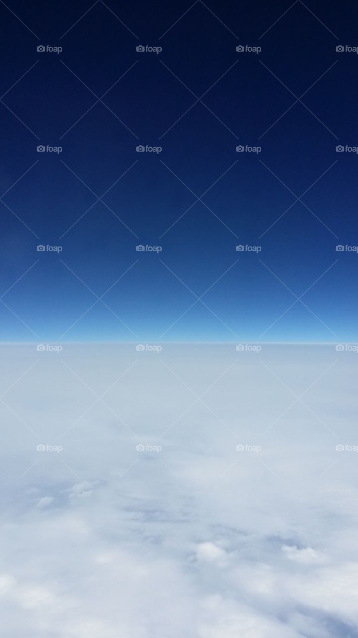 minimalist skyline. Phone camera on airplane