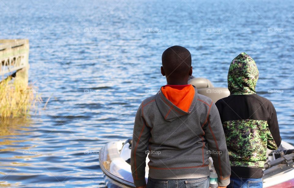 Holding the boat for Dad