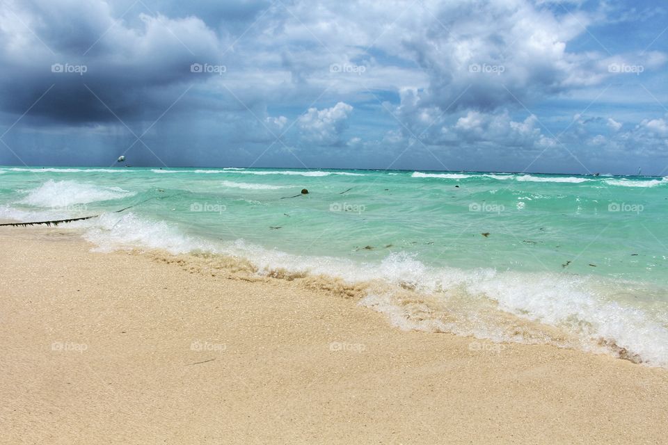 sthorm under caribbean sea with Paragliding flying near rain