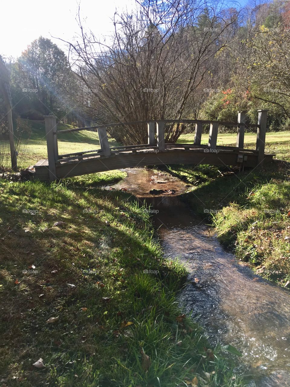 November mountain stream bridge