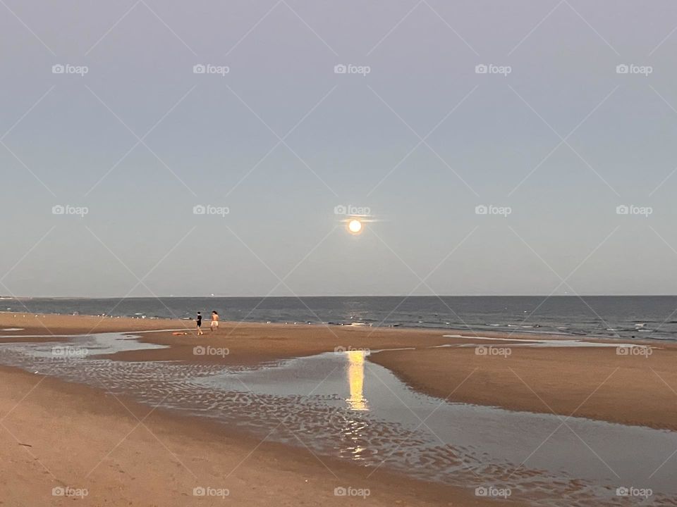 Moonlight reflection on beach