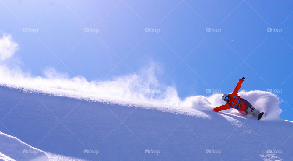 Surfing the snow and slashing the pow