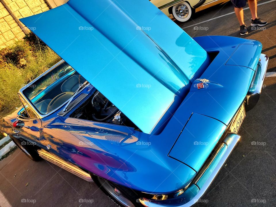 A beautifully restored Corvette is exhibited at a Southern California car show