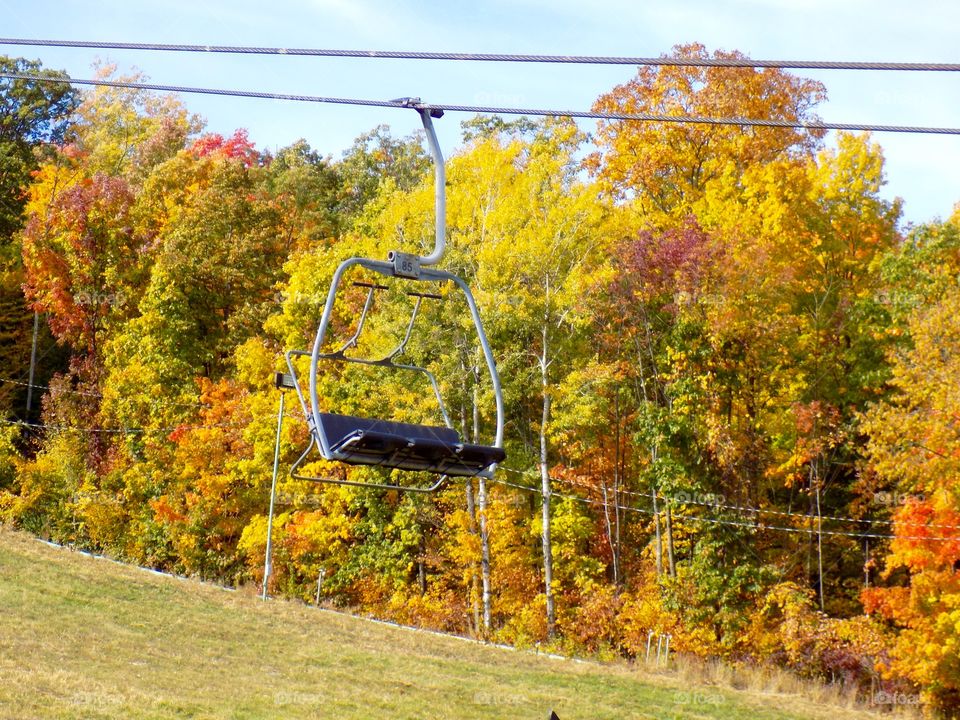 Ski chair with autumn foliage
