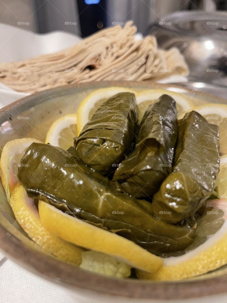 Vine leaves on a cushion of lemon 