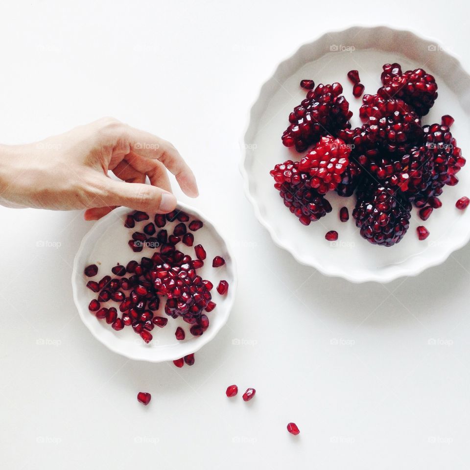 Holding food : Pomegranate 