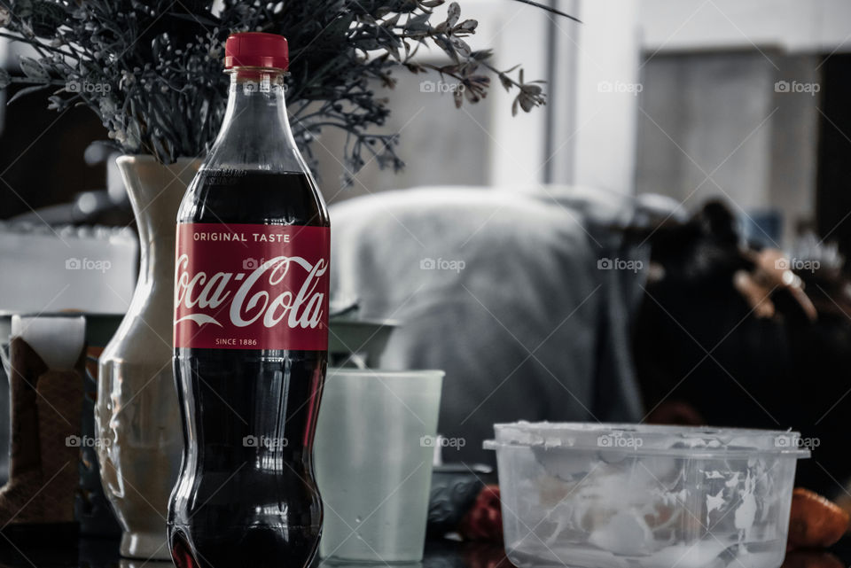 A random shot of a coca cola bottle in kitchen