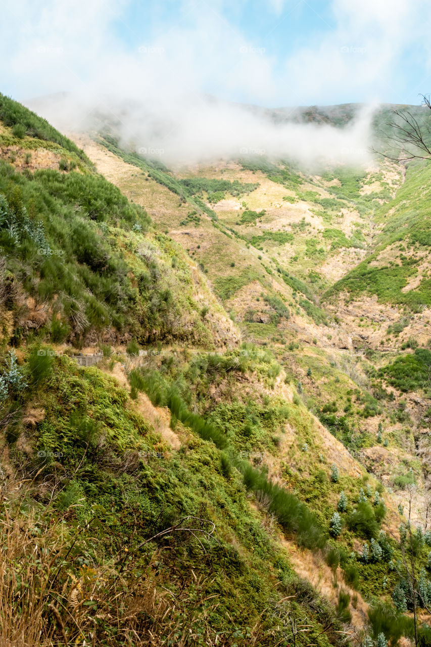 Clouds on the top of the mountain 