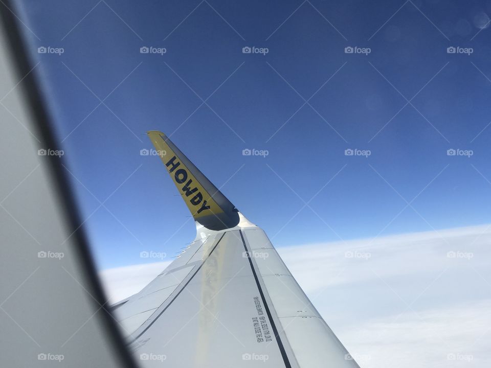 View from airplane window with message