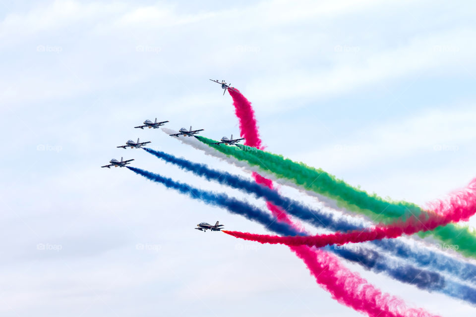 Al Fursan aerobatic team performing their tricks in the sky