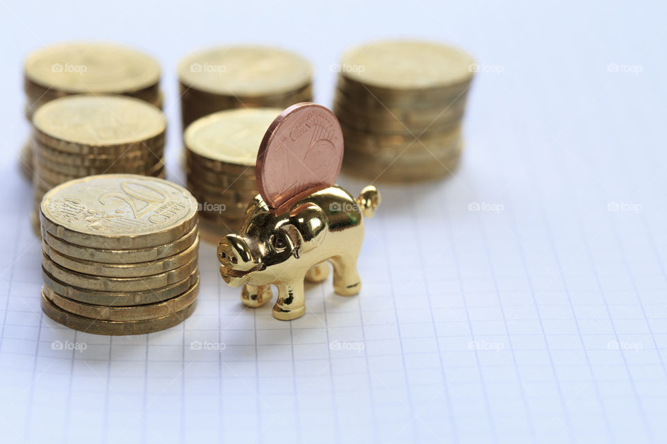 Piggy bank and euro cent