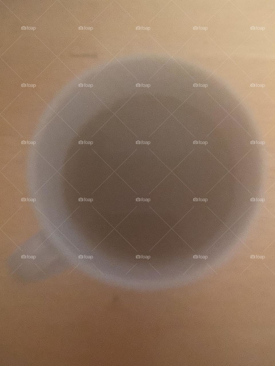 A cup of steaming hot black coffee steaming up my camera lens. I feel and see a little blurry in the early morning so hot coffee matches my mood. After coffee, I can face the world with a clear head.
