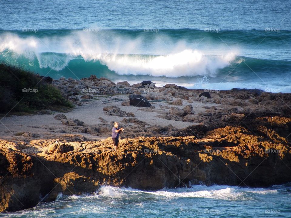 Man fishing at sea