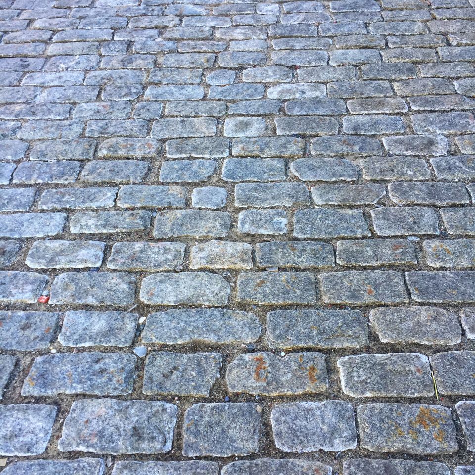 The cobblestones on the walking way of Salem, Massachusetts. These are gray and original to the town.