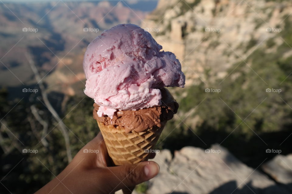 Hand holding ice cream