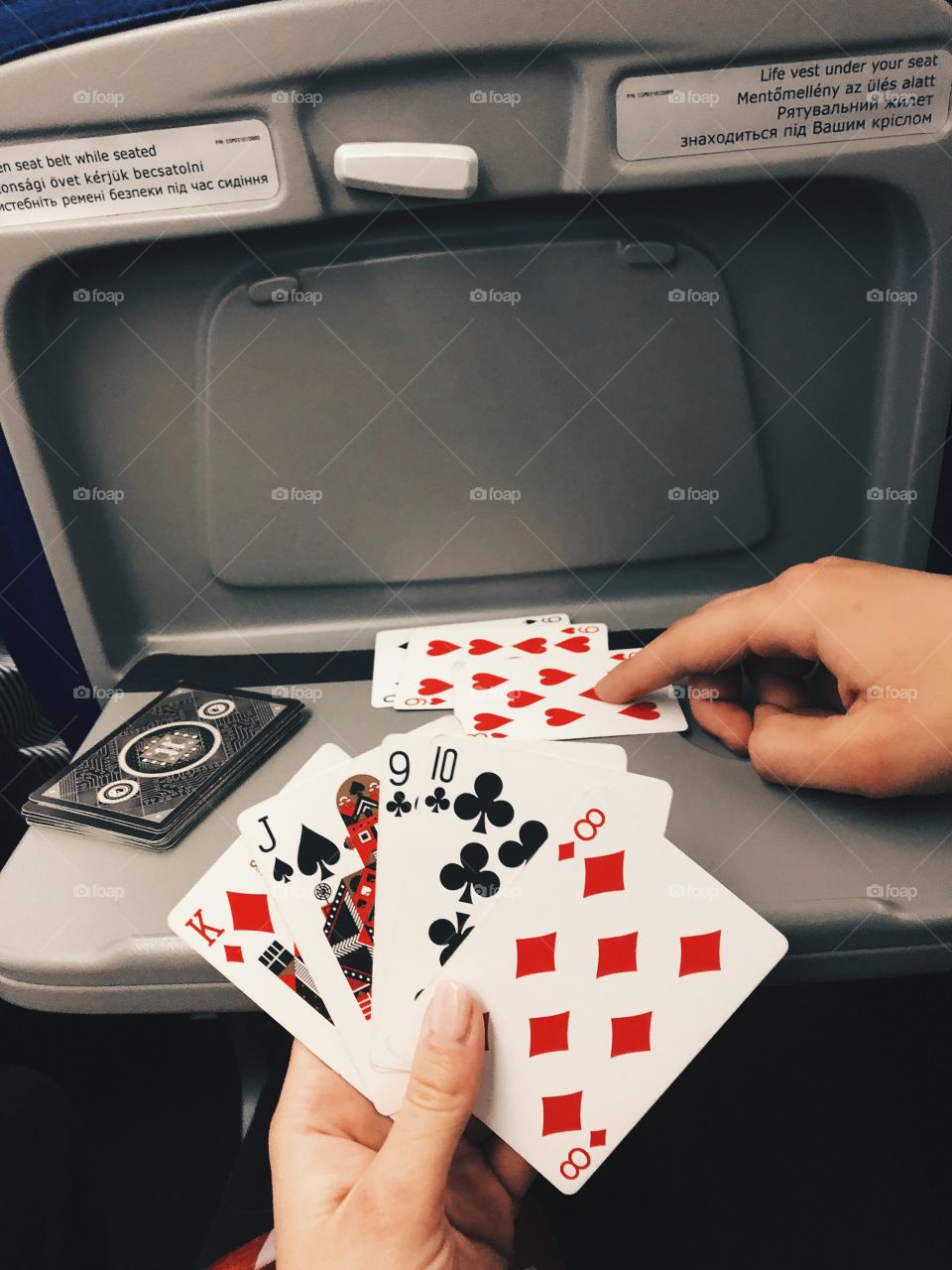 Playing cards in the airplane 