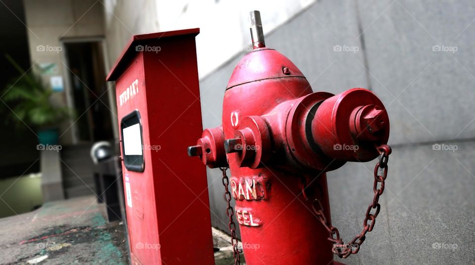Photo of a red hydrant, a hydrant is a public facility to prevent fires in the form of a water pump for firefighters when extinguishing a fire