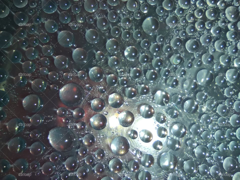 Condensation drops on the surface close-up