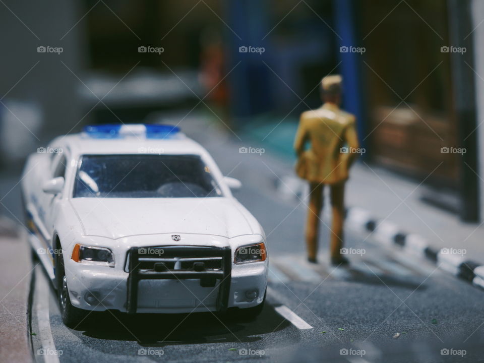 A miniature of white car