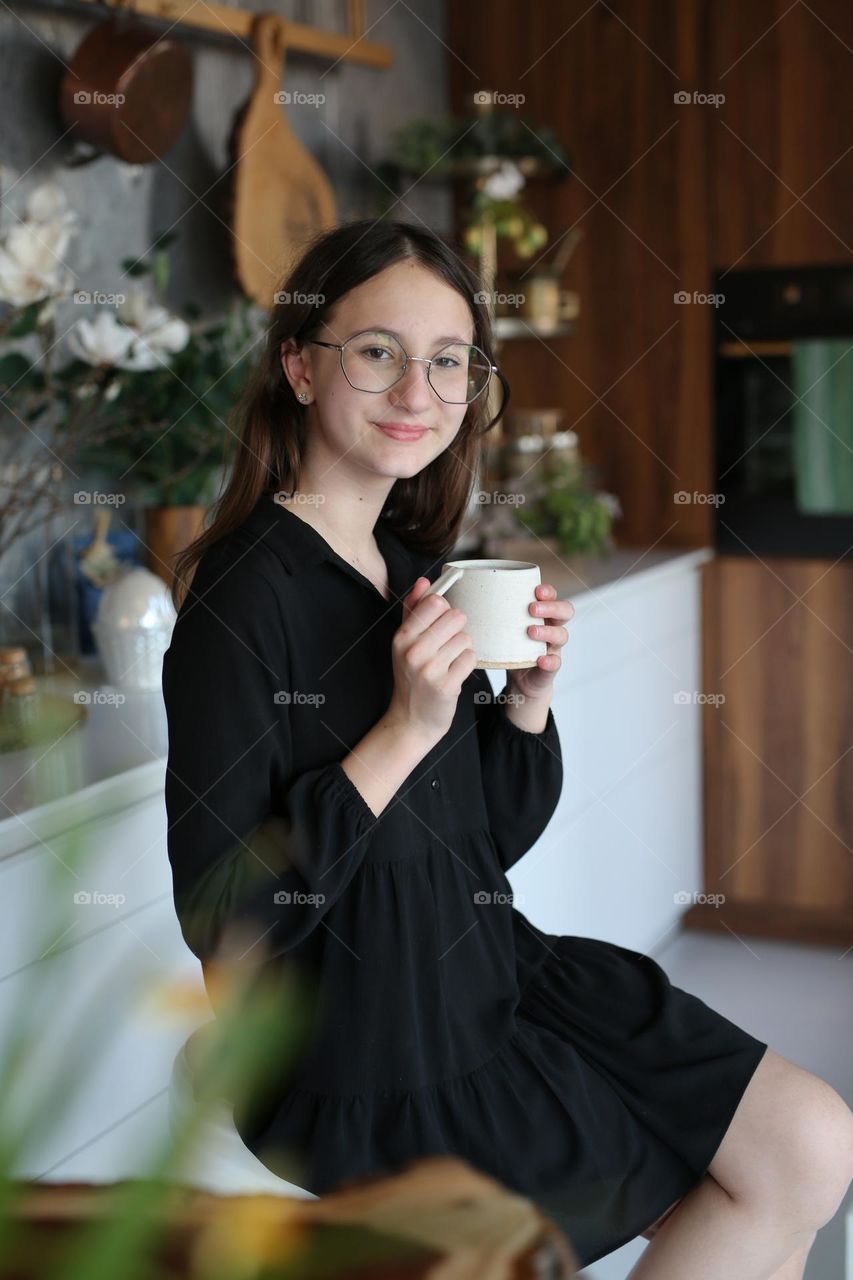 beautiful sixteen year old girl spends time at home