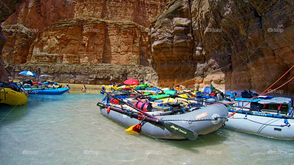 The Confluence where Havasu Creek meets the muddy Colorado River in the bottom of the Grand Canyon