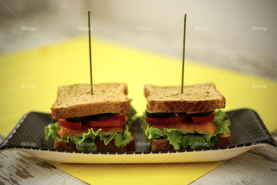 sandwiches on the yellow background 