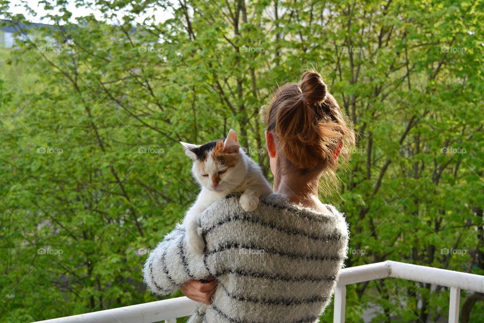 woman with cat love pet