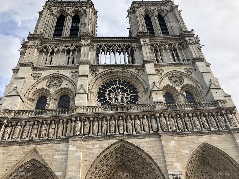 Massive & imposant front view of notre dame de Paris