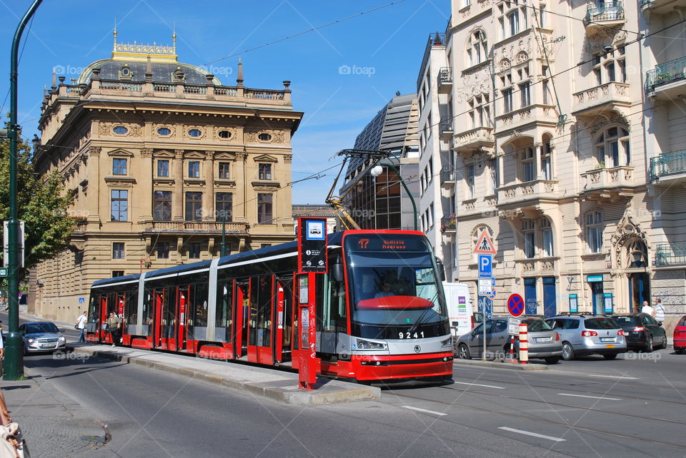 Red tram on the streets of Prague