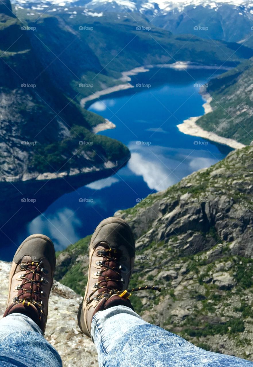 Reflection of lake from Trolltunga in Norway 
