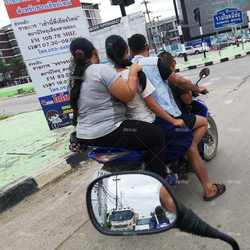 Family on motorbike in Thailand