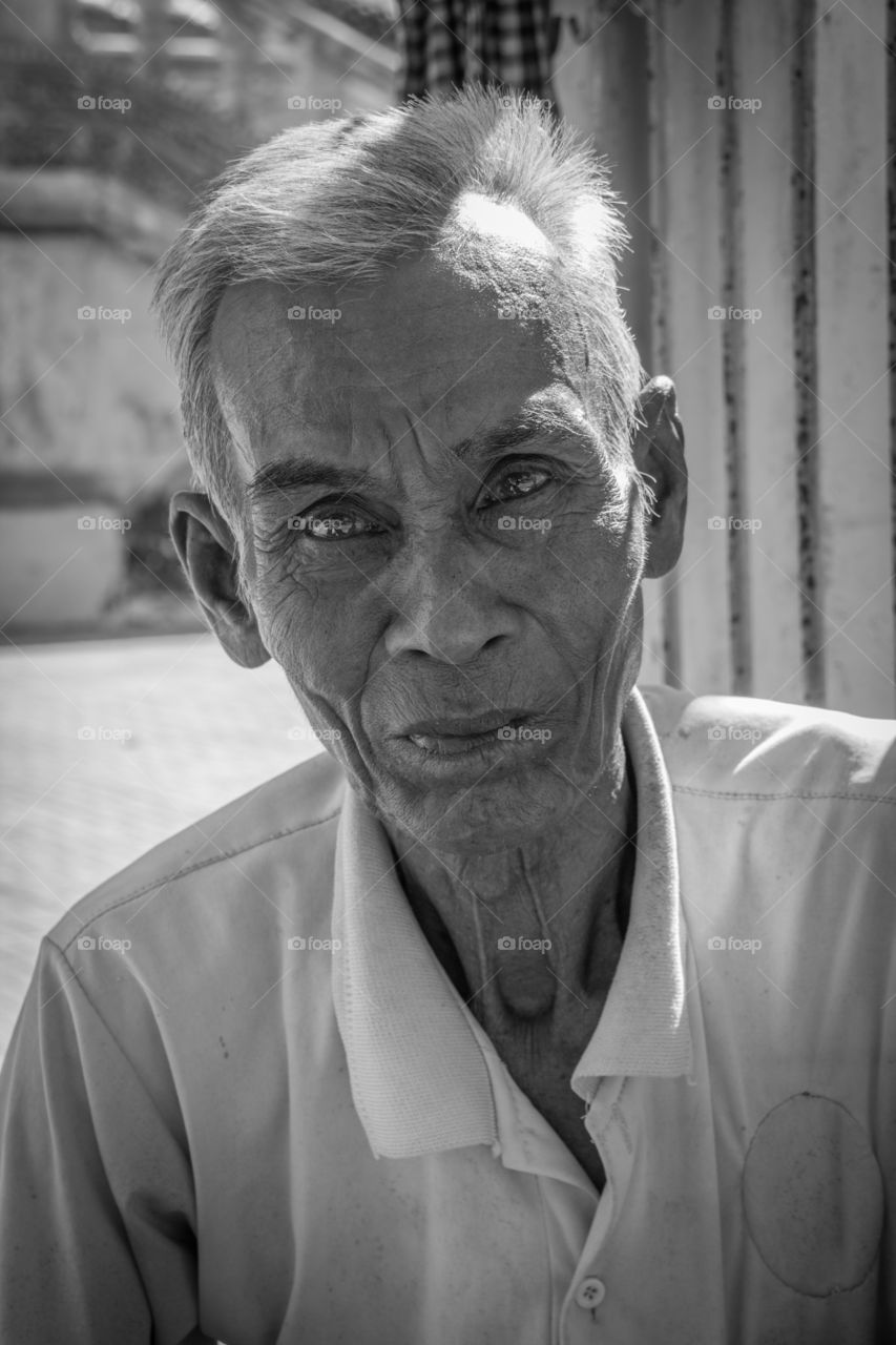 Portrait of a proud man at a wat