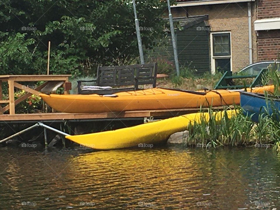 two canoes along the lake