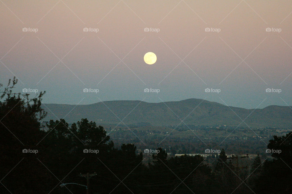 Mountain landscape with moon