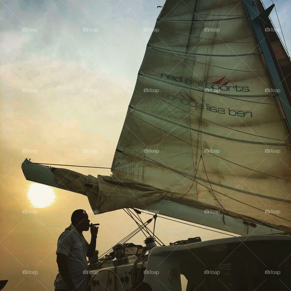 Sunset aboard a catamaran in Aruba, Dutch Antilles.