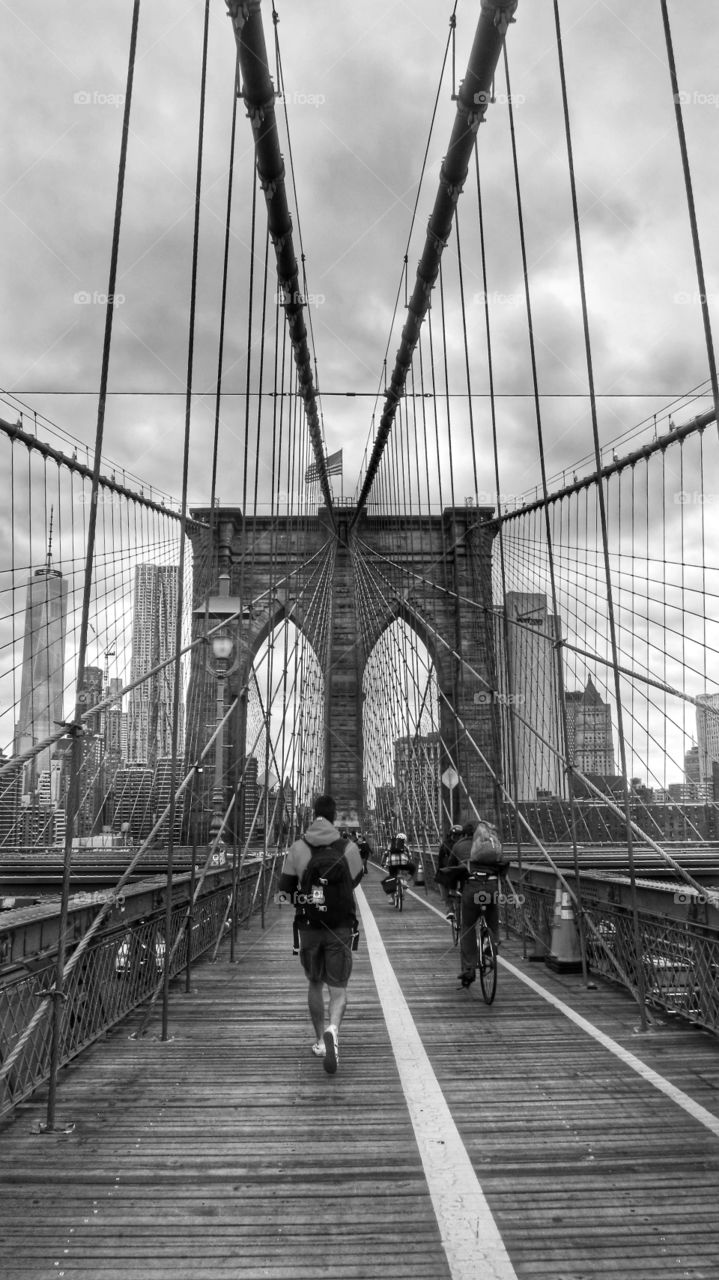 Commuting to work over the Brooklyn bridge in New York. 