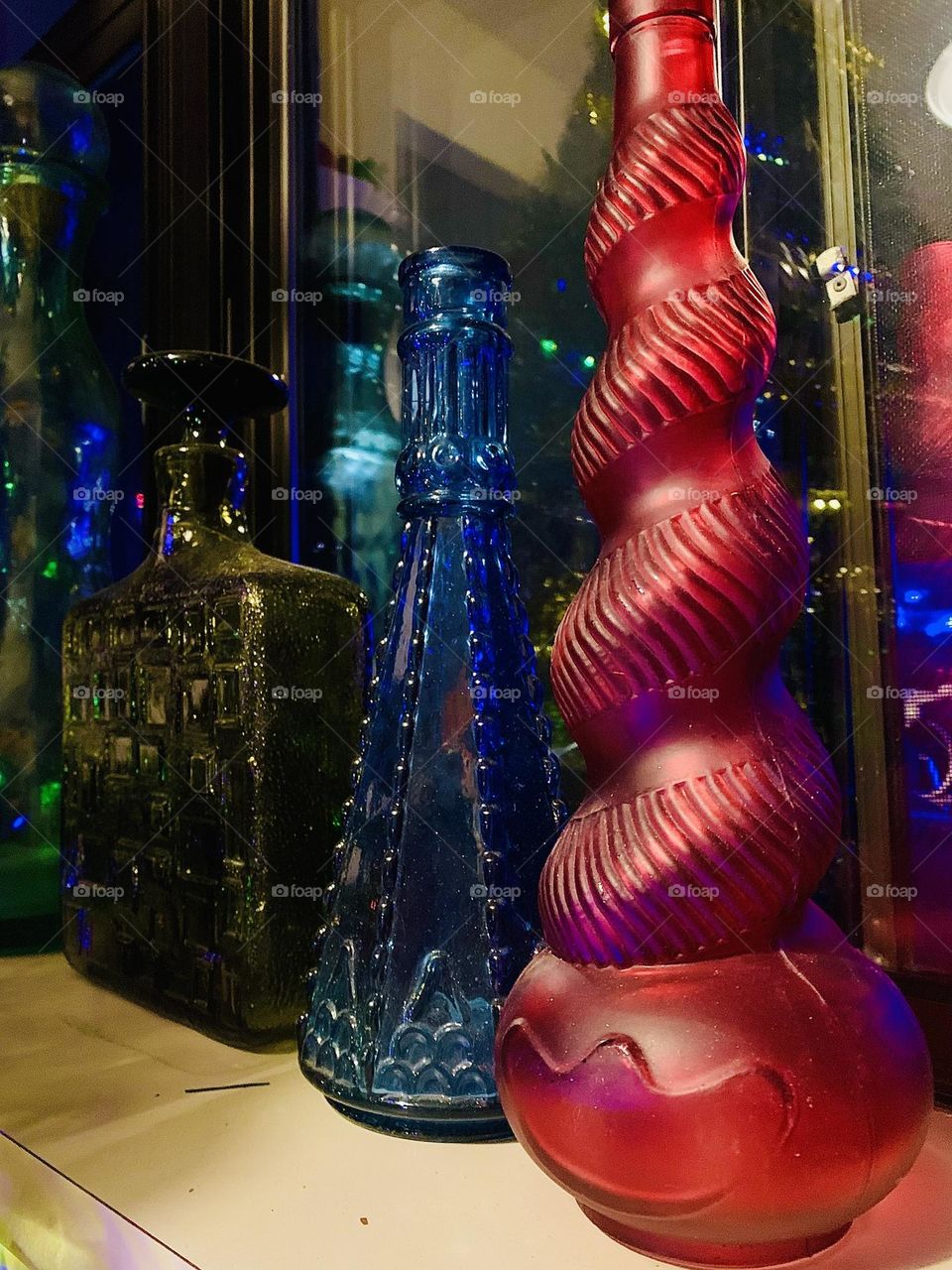 Colourful glass bottle decor 