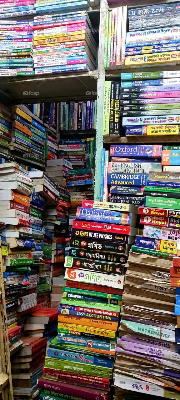 Secondhand bookstall at Nilkhet Book Market. Dhaka, Bangladesh.