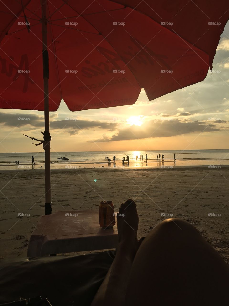 The sun sets on the Indian Ocean at Pantai Cenang