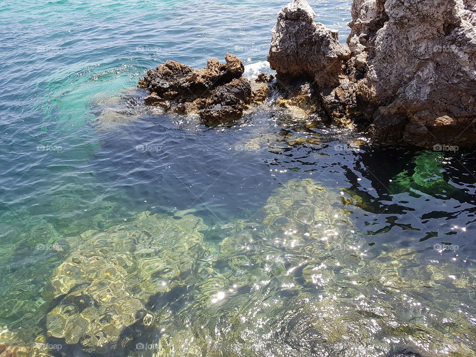 clean and shiny sea at Menorca