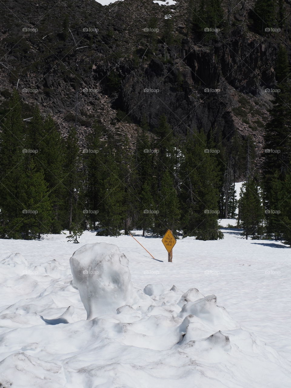 Deep snow remains high up in Oregon’s Cascade Mountains even in June on a sunny summer day. 