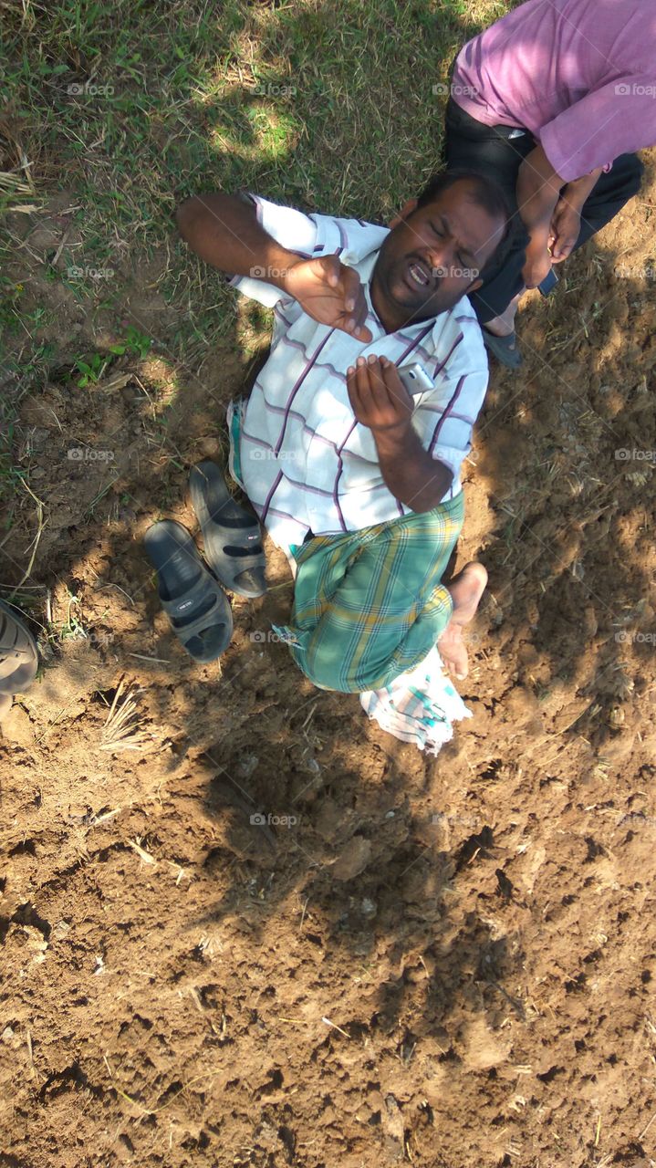 High angle view of person holding mobile phone