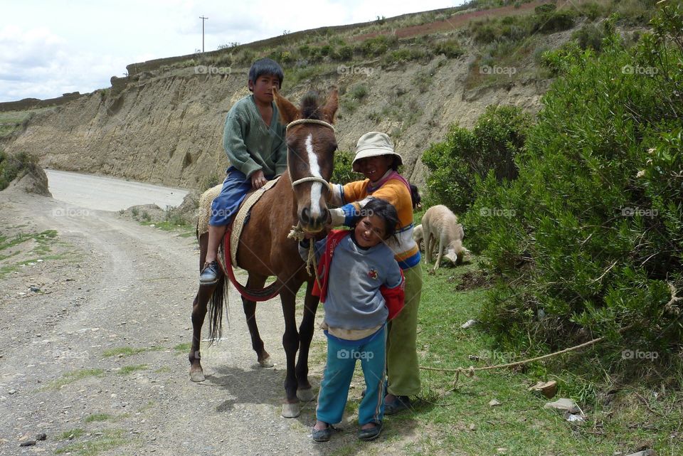Bolivian children pose for photo