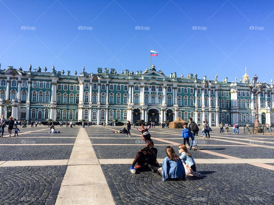 Enjoying the sun in front of the Hermitage Museum 